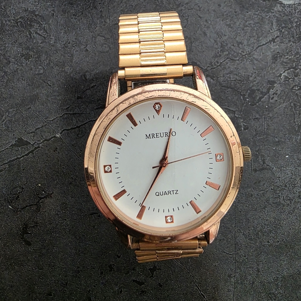 mens rose gold tone mreurio watch with stretch band